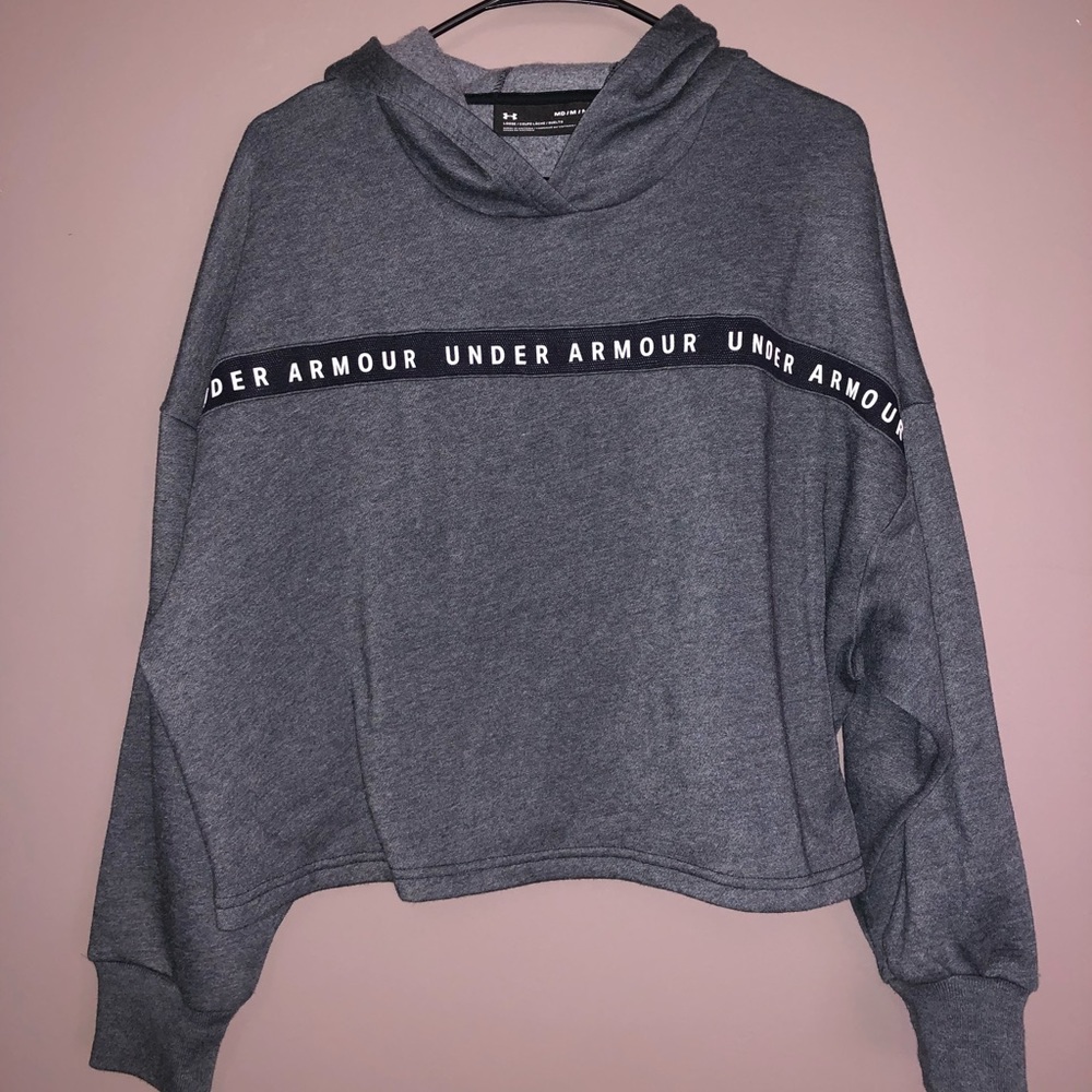 never worn. Under Armour cropped hoodie. dark grey.
